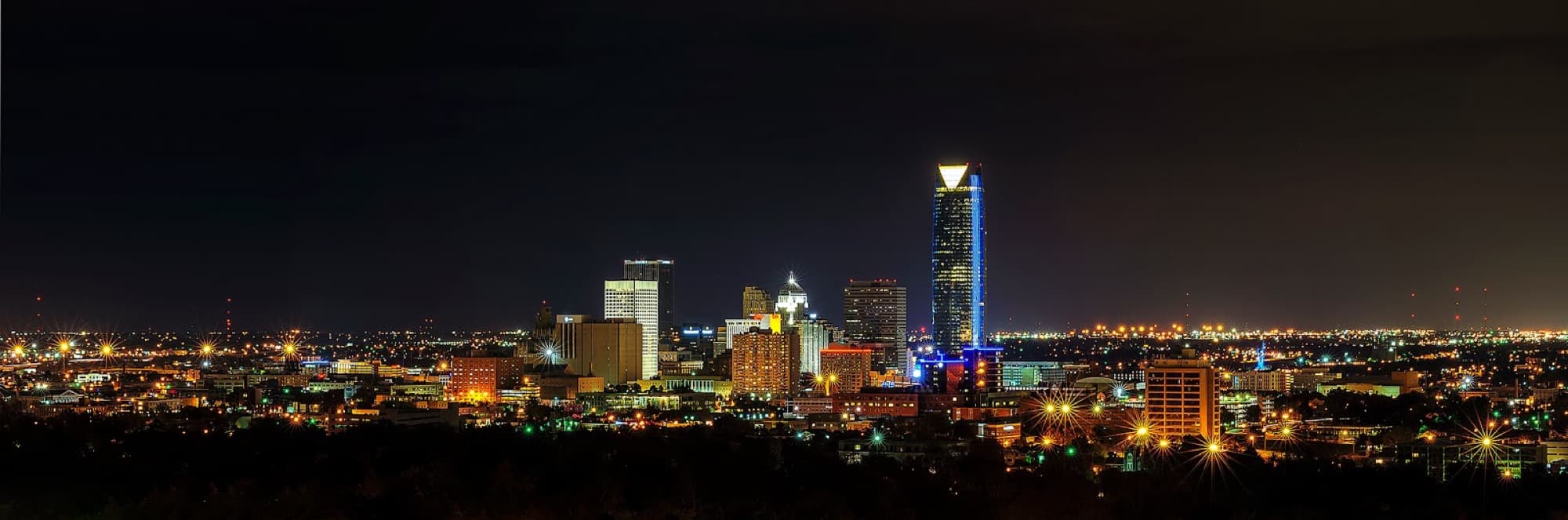 Oklahoma City skyline panorama at night.